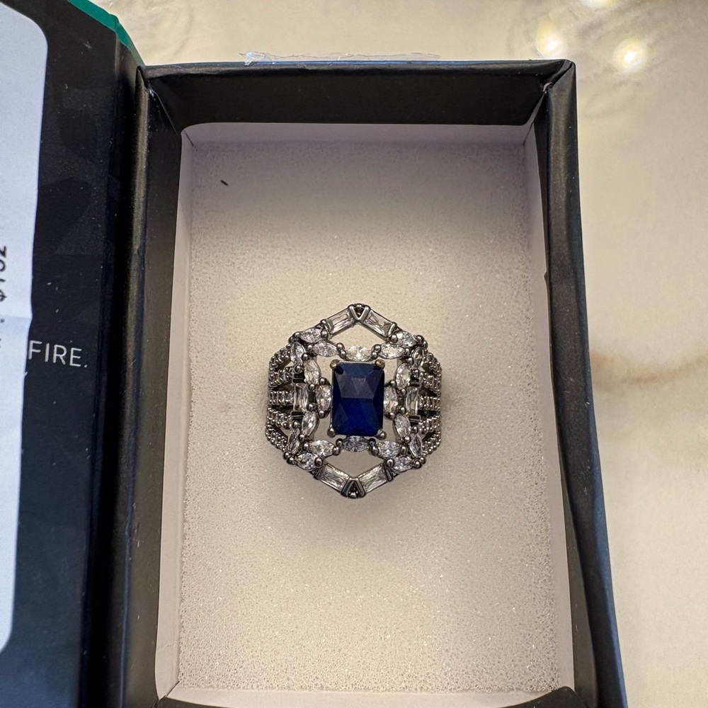 Lab created Sapphire fused with genuine quartz. Hematite plating. Size 6